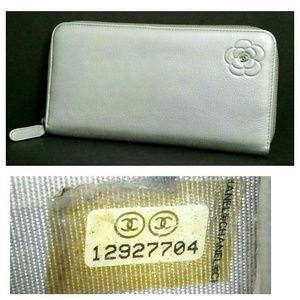 Chanel Silver Camellia Zip Wallet - Elegant Leather Organizer